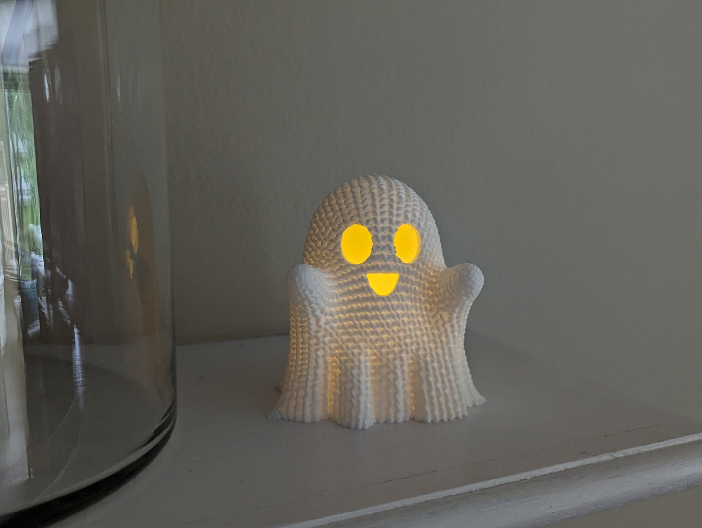 3d printed crochet textured ghost with led tea light on mantel